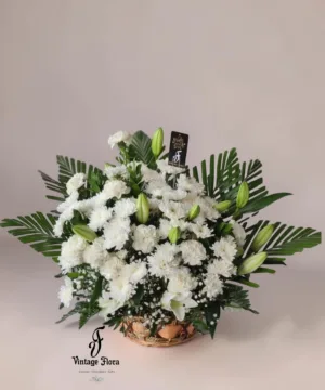 Peaceful White Lilies In A Basket